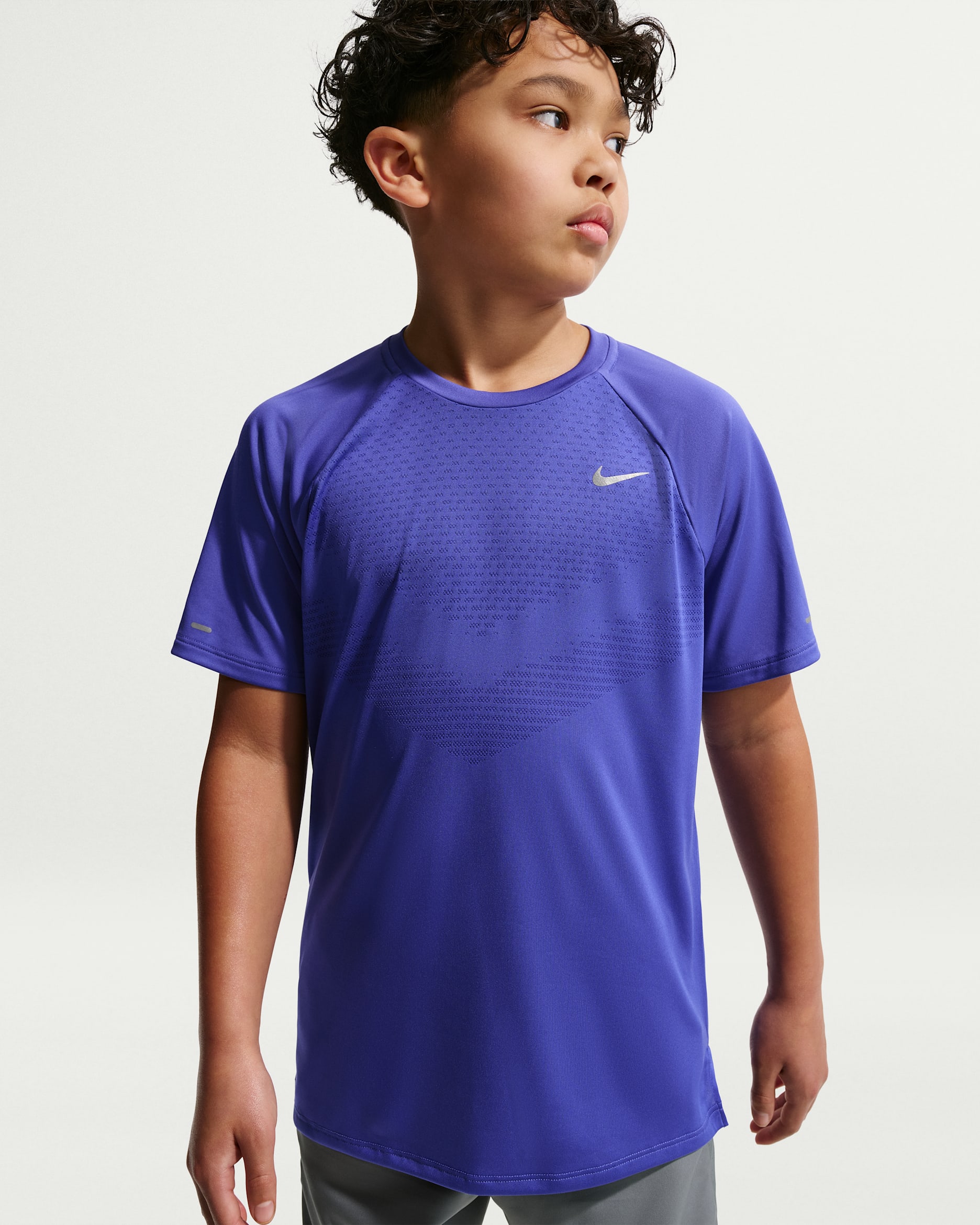 Nike Stride Older Kids' Dri-FIT Short-Sleeve Top. Nike HR